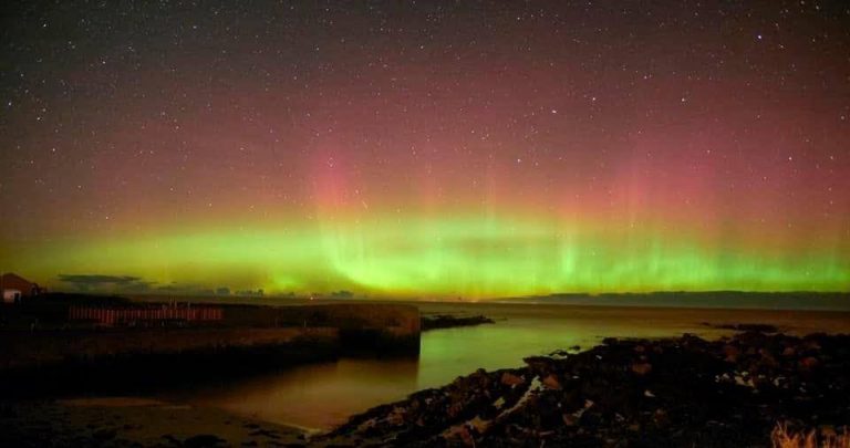 Northern lights with Pillars over Moray Firth